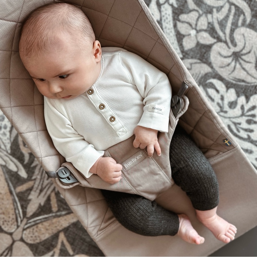 NEWBIE henley style long sleeved bodysuit